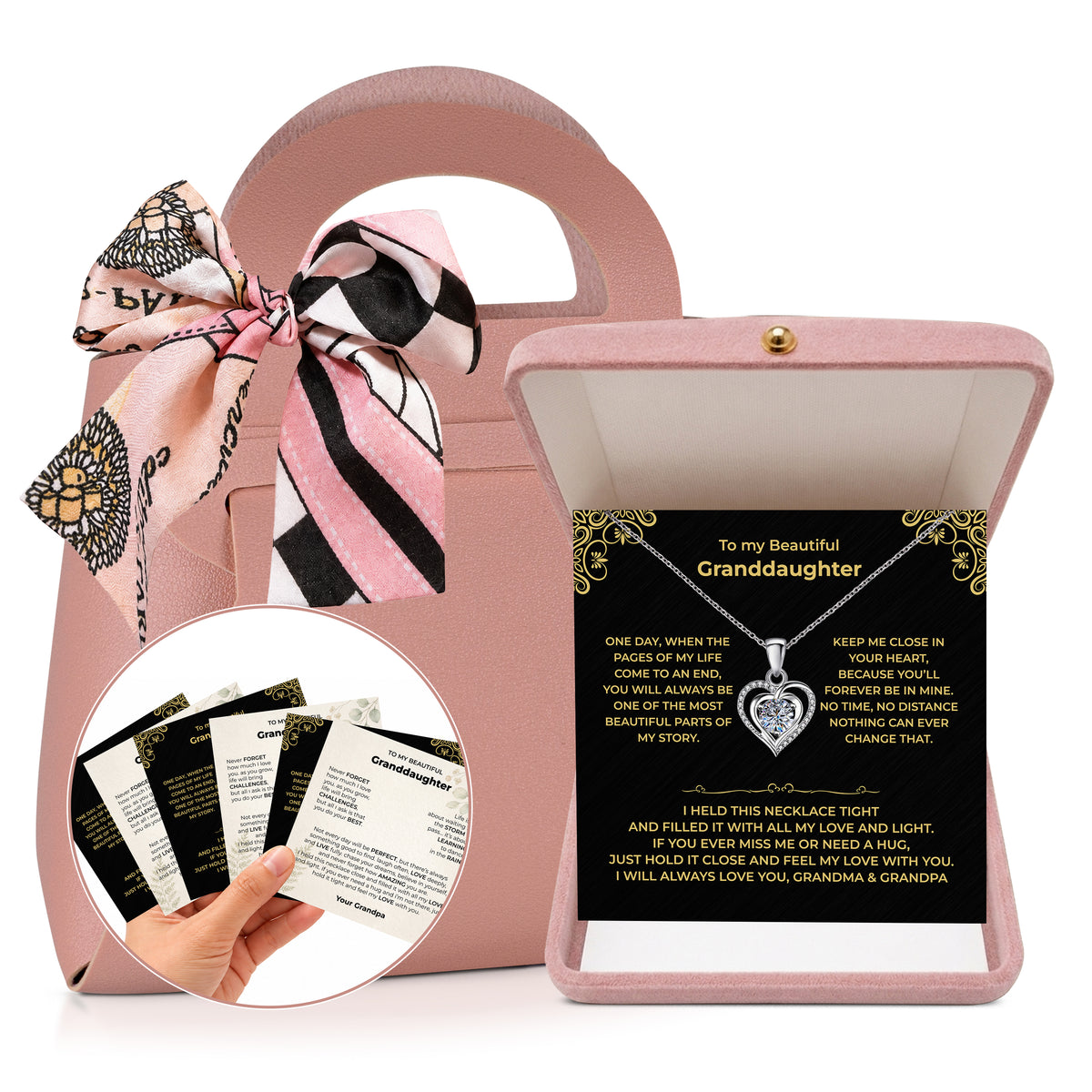 Open pink velvet box with a granddaughter heart necklace on a cream botanical message card